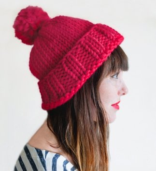 girl wearing red knit hat