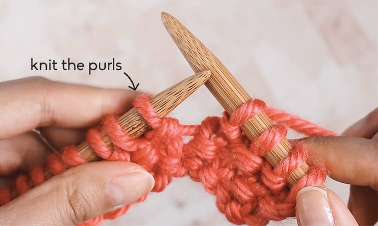 hands holding knitting