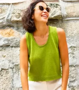 girl wearing a green knit tank top