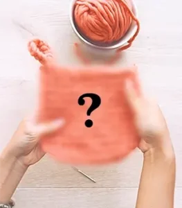 pink pot mat that is knit