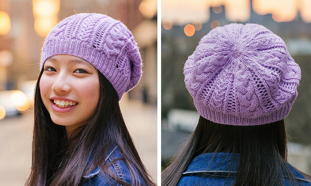 girl wearing a purple knit hat with cables and lace.