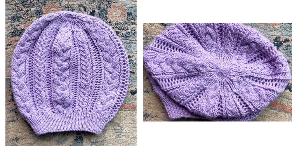 a flat lay image of a purple cables and lace knit hat
